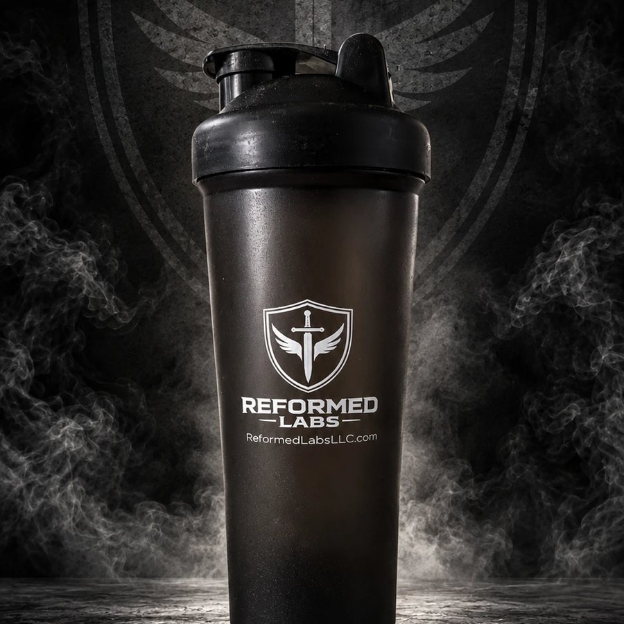 Reformed Labs shaker bottle — matte black with the shield-and-sword lockup and ReformedLabsLLC.com on the front